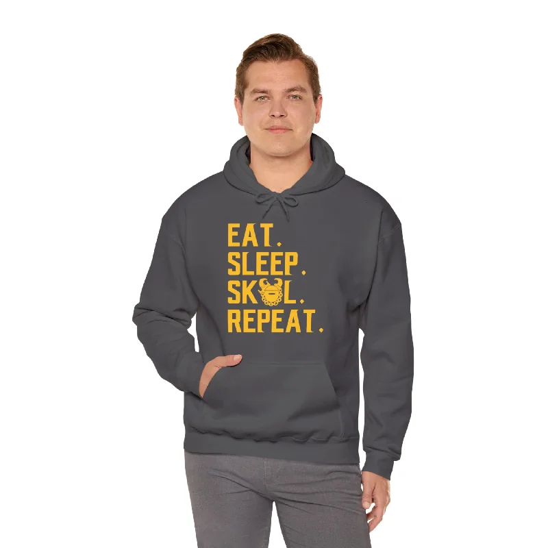 hoodie in soft yellows -Unisex Heavy Blend™ Hoodie - Eat. Sleep. Repeat.